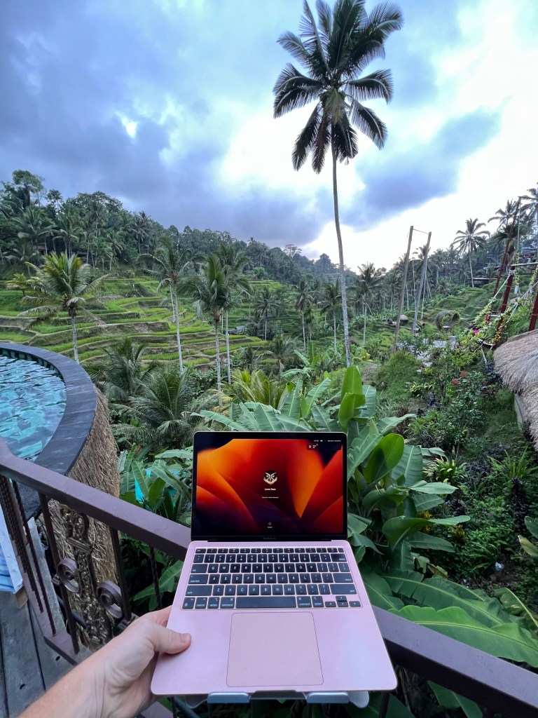 Working as a digital nomad in Bali — laptop over the rice terraces