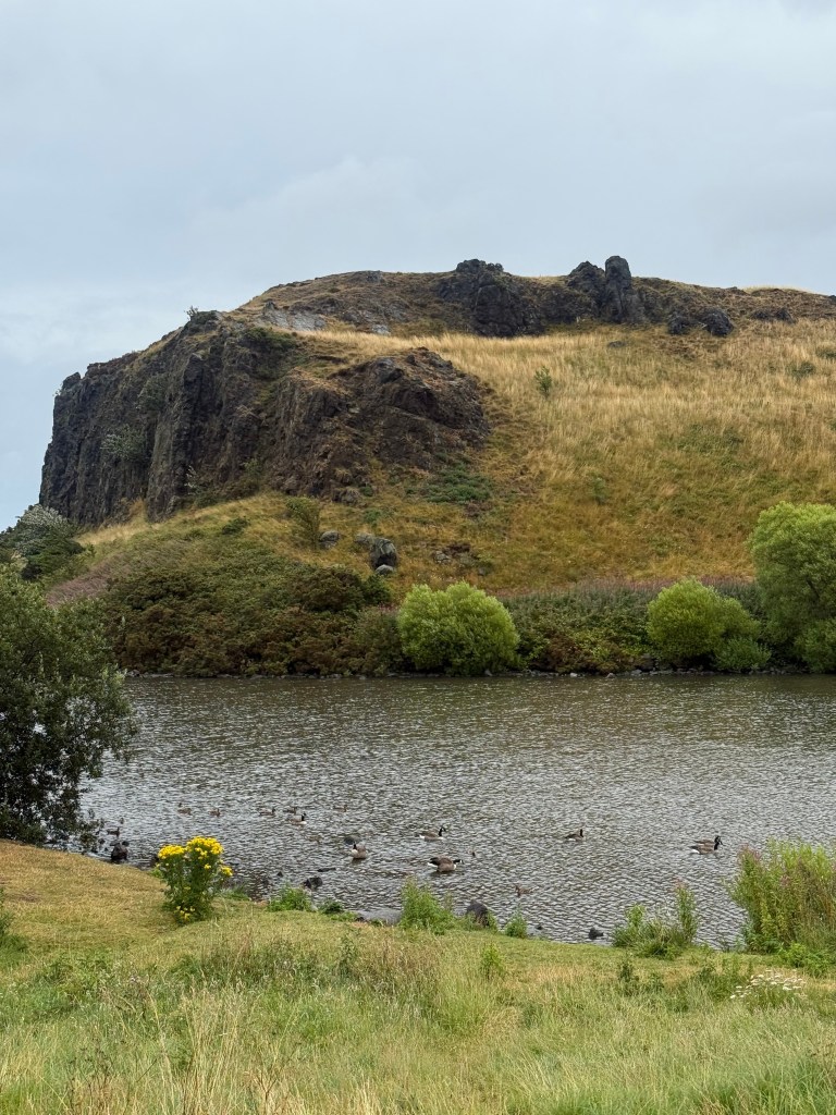 Crags above the loch in Holyrood Park, a favourite walk for a digital nomad in Edinburgh